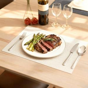 imageDurable Vinyl Placemats Set of 4 NonSlip for Dining Table Mat Heat Resistant Place Mats Washable AntiSlip PVC Easy to Clean Wipeable Premium Plastic Mats for Kitchen BeigeBeige