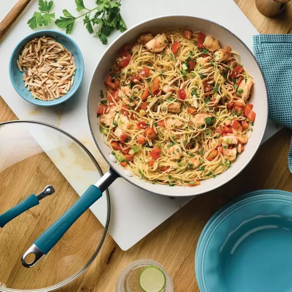 imageRachael Ray Cucina Ceramic Nonstick Saute Pan with Lid 3 Quart Non Stick Sauteuse Pan Dishwasher Safe  AlmondMarine Blue