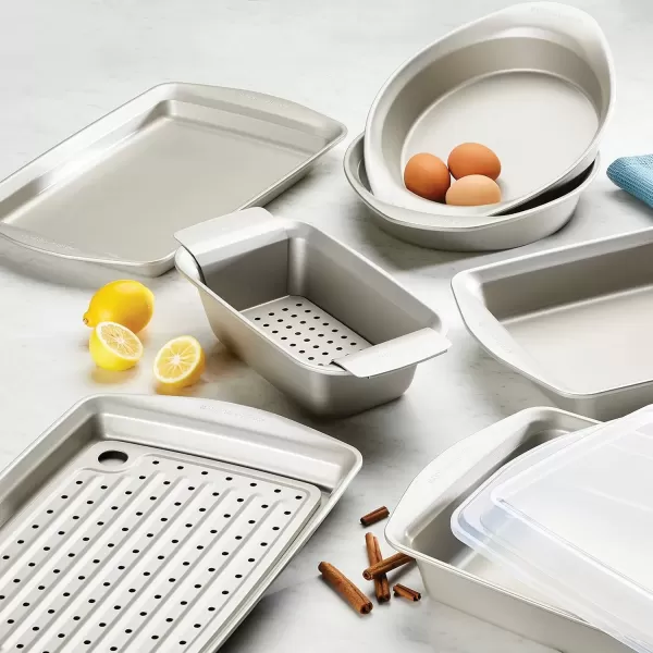 imageRachael Ray Nonstick Bakeware Set without Grips includes Nonstick Baking Pan with Lid and Muffin Pan  Cupcake Pan  3 Piece Silver2 Piece
