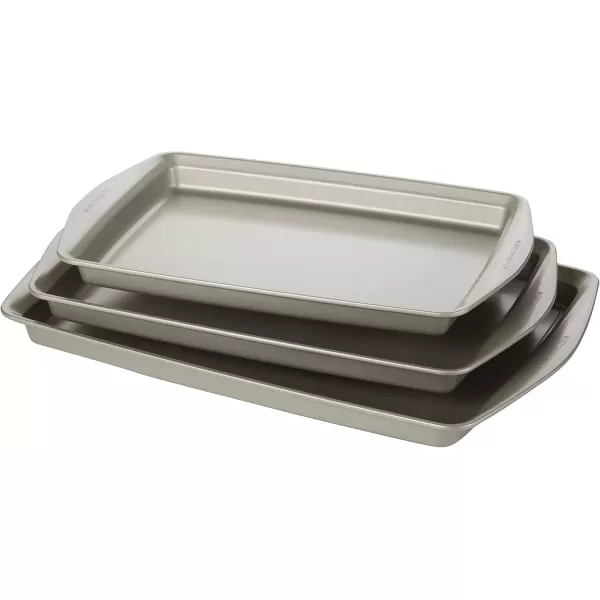 imageRachael Ray Nonstick Bakeware Set without Grips includes Nonstick Baking Pan with Lid and Muffin Pan  Cupcake Pan  3 Piece Silver3 Piece