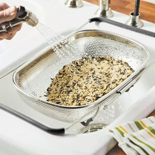 imageRachael Ray Tools and Gadgets OverTheSink ColanderStrainer for Pasta Fruits Veggies Expandable Silicone Grips Dishwasher Safe 45 Quart Stainless Steel with Gray HandlesStainless Steel with Gray Handles