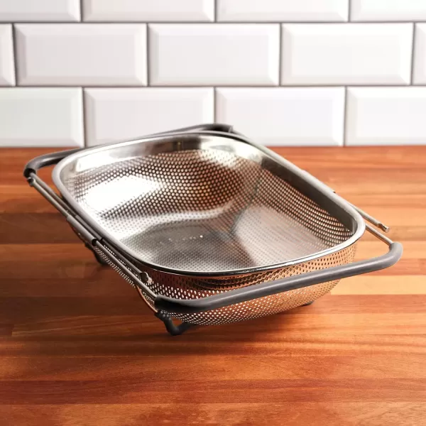 imageRachael Ray Tools and Gadgets OverTheSink ColanderStrainer for Pasta Fruits Veggies Expandable Silicone Grips Dishwasher Safe 45 Quart Stainless Steel with Gray HandlesStainless Steel with Gray Handles