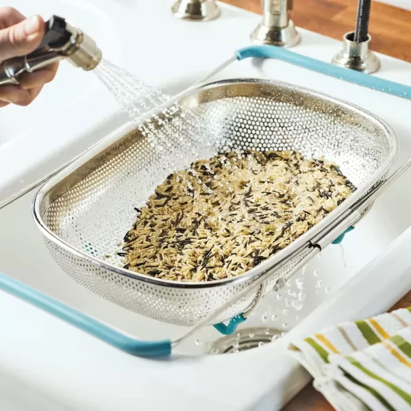 imageRachael Ray Tools and Gadgets OverTheSink ColanderStrainer for Pasta Fruits Veggies Expandable Silicone Grips Dishwasher Safe 45 Quart Stainless Steel with Gray HandlesStainless Steel with Agave Blue Handles