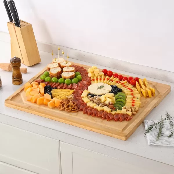 imageHiware Bamboo Cutting Board for Kitchen Heavy Duty Wood Cutting Board with Juice Groove 100 Organic Bamboo Pre Oiled 15quot x 10quotNatural