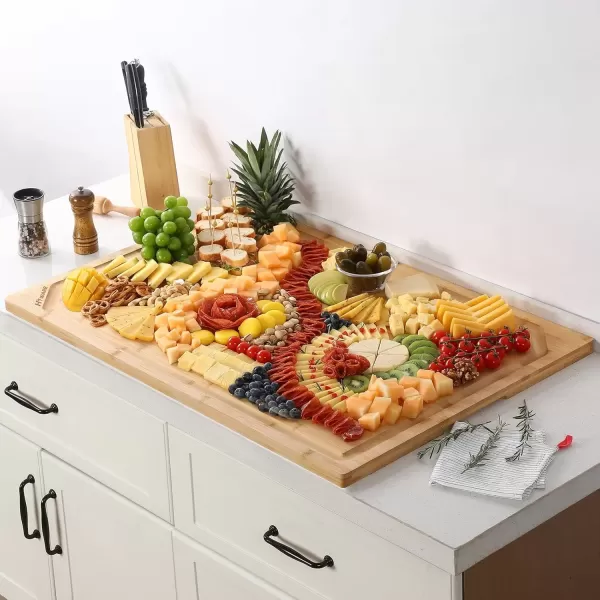 imageHiware Bamboo Cutting Board for Kitchen Heavy Duty Wood Cutting Board with Juice Groove 100 Organic Bamboo Pre Oiled 15quot x 10quotNatural
