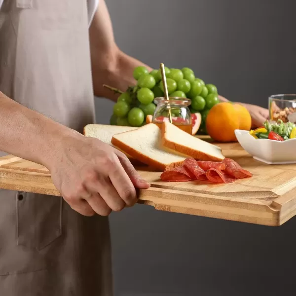 imageHiware Bamboo Cutting Board for Kitchen Heavy Duty Wood Cutting Board with Juice Groove 100 Organic Bamboo Pre Oiled 15quot x 10quotNatural