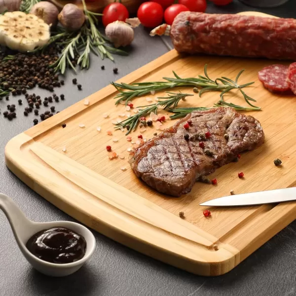 imageLarge Wooden Cutting Board for Kitchen Meal Prep ampamp Serving  Bamboo Cutting Boards with Juice Groove Side Handles Charcuterie ampamp Chopping Butcher Block  100 Organic Bamboo Pre Oiled 16quot x 10quot