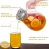 imageHIWARE 64 Ounces Glass Pitcher with Stainless Steel Lid  Water Carafe with Handle  Good Beverage Pitcher for Homemade Juice ampamp Iced Tea Cleaning Brush Included