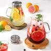 imageHIWARE 64 Ounces Glass Pitcher with Stainless Steel Lid  Water Carafe with Handle  Good Beverage Pitcher for Homemade Juice ampamp Iced Tea Cleaning Brush Included