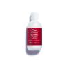 imageWella Professionals ULTIMATE REPAIR Shampoo Professional Lightweight Cream Shampoo for Damaged Hair33 Fl Oz Pack of 1