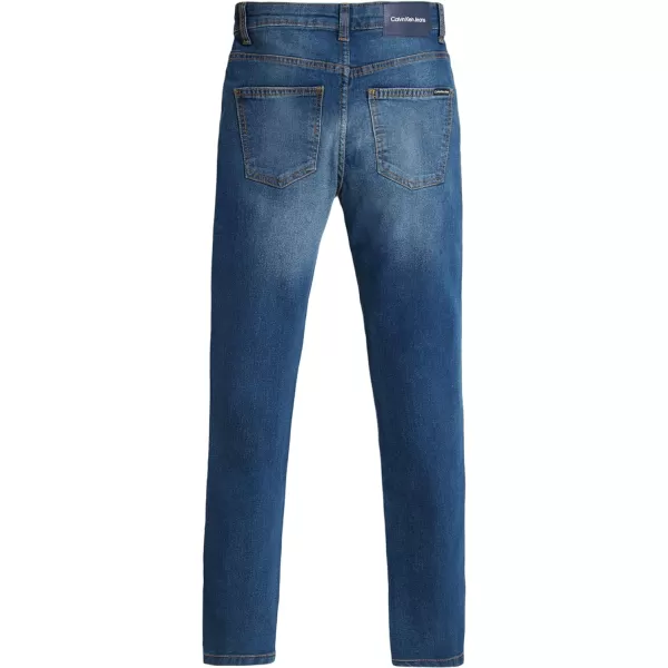 Calvin Klein Boys Skinny Fit Stretch Denim Jeans 5Pocket Style amp Zipper ClosureHouston Mid Blue