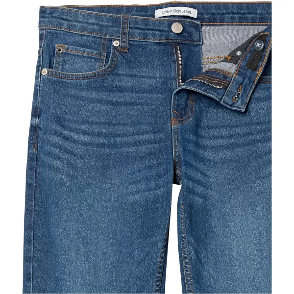 Calvin Klein Boys Slim Fit Straight Leg Stretch Denim Jeans 5 Pocket Style amp Zipper ClosureHouston Mid Blue