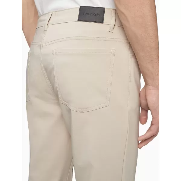 Calvin Klein Mens Move 365 Stretch Slim Fit Wrinkle Resistant Tech Woven PantPlaza Taupe