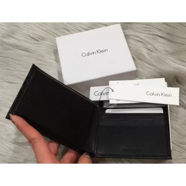 Calvin Klein Mens RFID Leather Minimalist Bifold WalletBlackBlack Solid