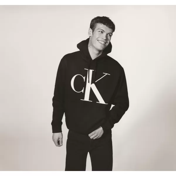 Calvin Klein Mens Relaxed Fit Monogram Logo Fleece HoodieBlack Beauty