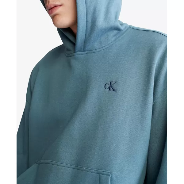 Calvin Klein Mens Relaxed Fit Monogram Logo Fleece HoodieBlue Lake
