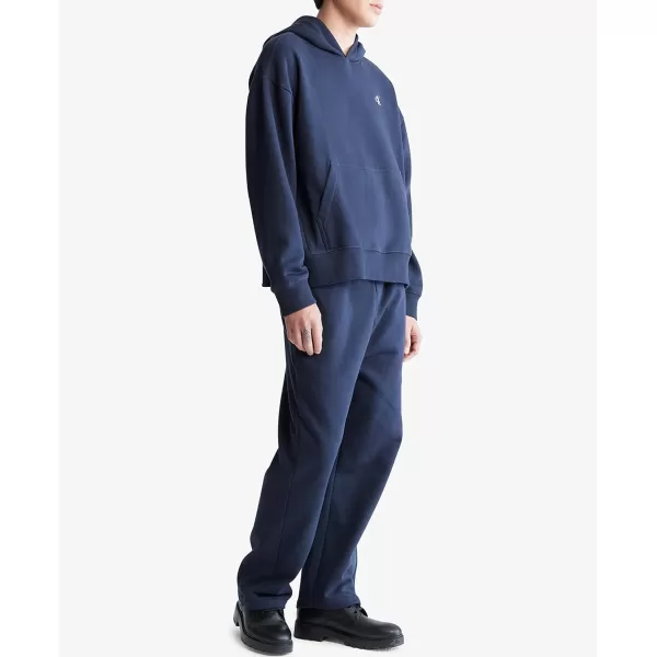 Calvin Klein Mens Relaxed Fit Monogram Logo Fleece HoodieDark Sapphire