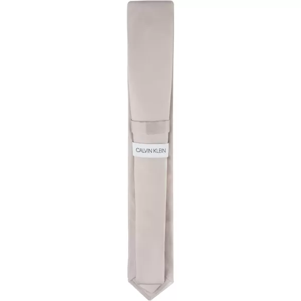 Calvin Klein Mens Unison Solid Slim TieNatural