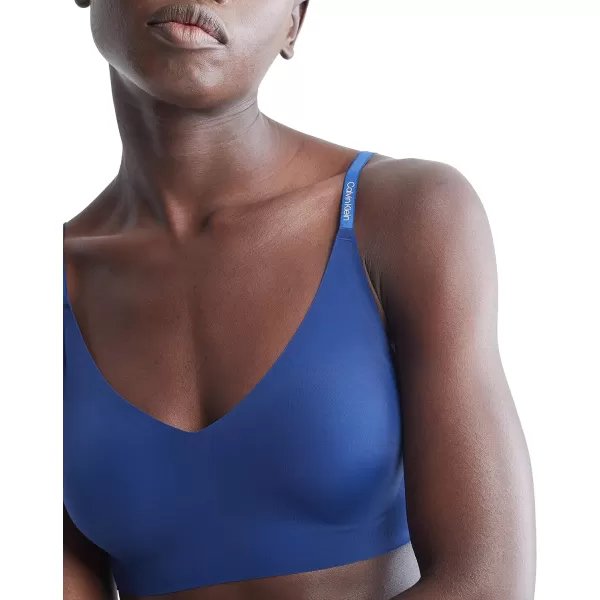 Calvin Klein Womens Invisibles Comfort Lightly Lined Seamless Wireless Triangle Bralette BraBlue Depths