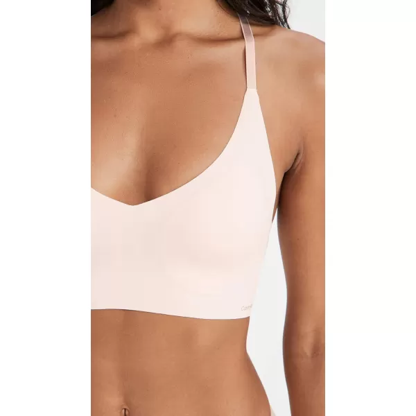 Calvin Klein Womens Invisibles Comfort Lightly Lined Seamless Wireless Triangle Bralette BraNymphs Thigh Lace Racerback