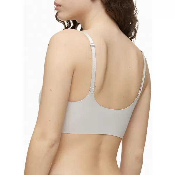 Calvin Klein Womens Invisibles Comfort Lightly Lined Seamless Wireless Triangle Bralette BraOcean Storm