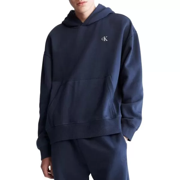 Calvin Klein Mens Relaxed Fit Monogram Logo Fleece HoodieDark Sapphire