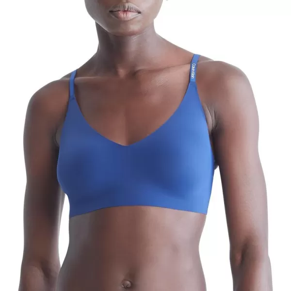 Calvin Klein Womens Invisibles Comfort Lightly Lined Seamless Wireless Triangle Bralette BraBlue Depths