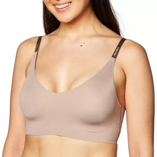 Calvin Klein Womens Invisibles Comfort Lightly Lined Seamless Wireless Triangle Bralette BraJosephine