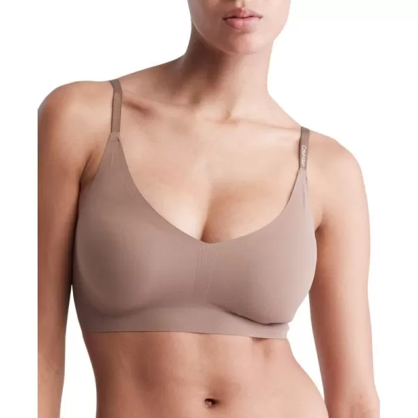 Calvin Klein Womens Invisibles Comfort Lightly Lined Seamless Wireless Triangle Bralette BraMauve Brown