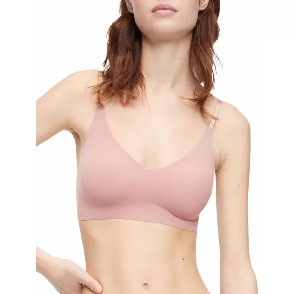 Calvin Klein Womens Invisibles Comfort Lightly Lined Seamless Wireless Triangle Bralette BraRed Grape