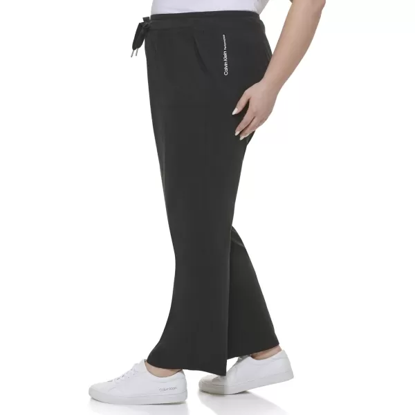 imageCalvin Klein Performance Womens Fleece Plus Size High Waist Full Length Flare PantBlack