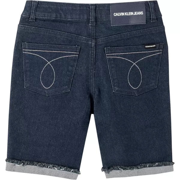 imageCalvin Klein Girls Skinny Fit Stretch Denim Bermuda Jean ShortsDark RiseCut Off