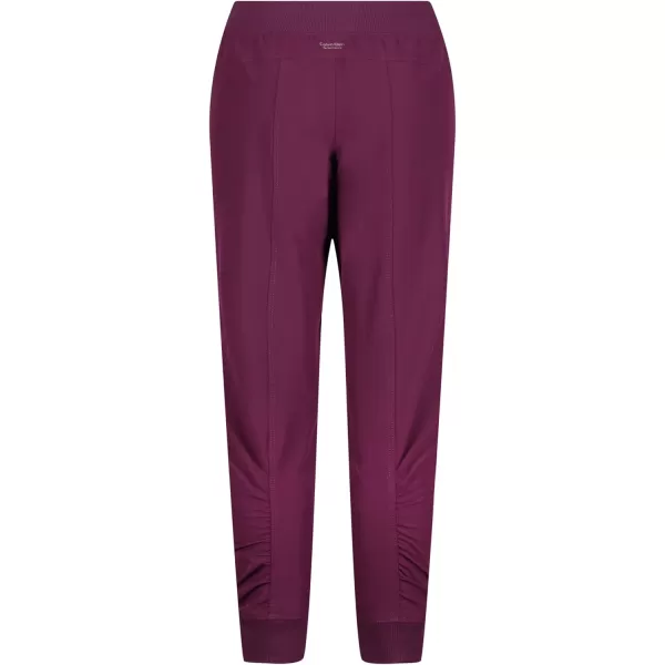 imageCalvin Klein Girls Soft Fleece Logo Sweatpants Comfortable Fit and Elastic WaistbandDark Purple Ckp