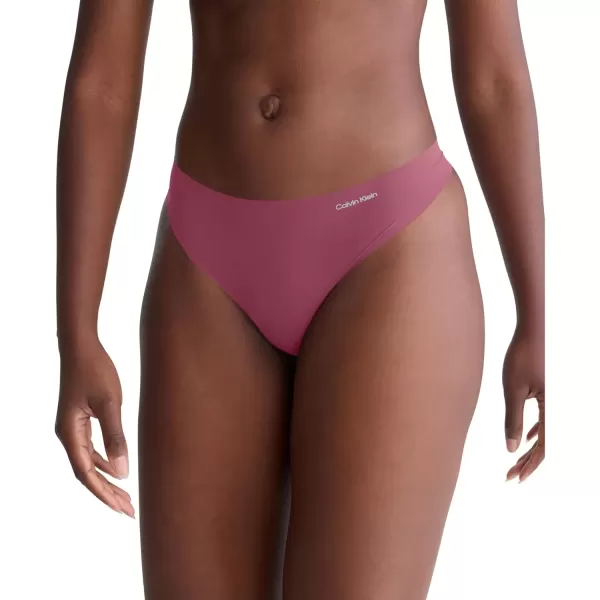imageCalvin Klein Womens Invisibles Seamless Thong PantyDeep Mauve W Fresh Taupe Logo