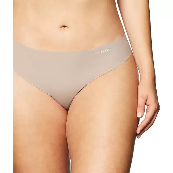 imageCalvin Klein Womens Invisibles Seamless Thong PantyGrey Heather