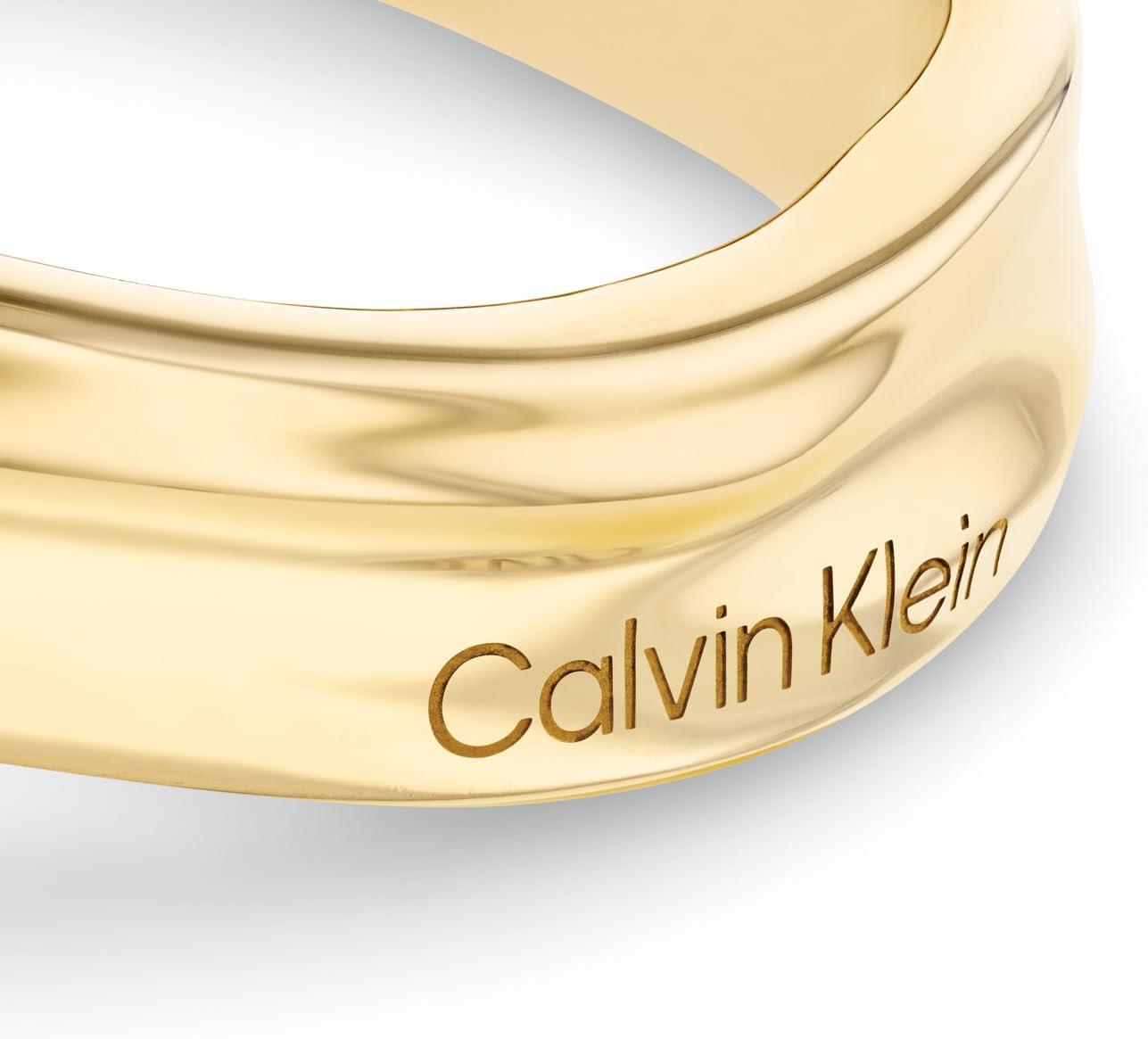 imageCalvin Klein Elemental Bangle Bracelet for Women  Organic Inspired Design Boldly Sculpted  Stainless Steel Hinge closure  Jewelry Accessories Gift for HerGold Plated