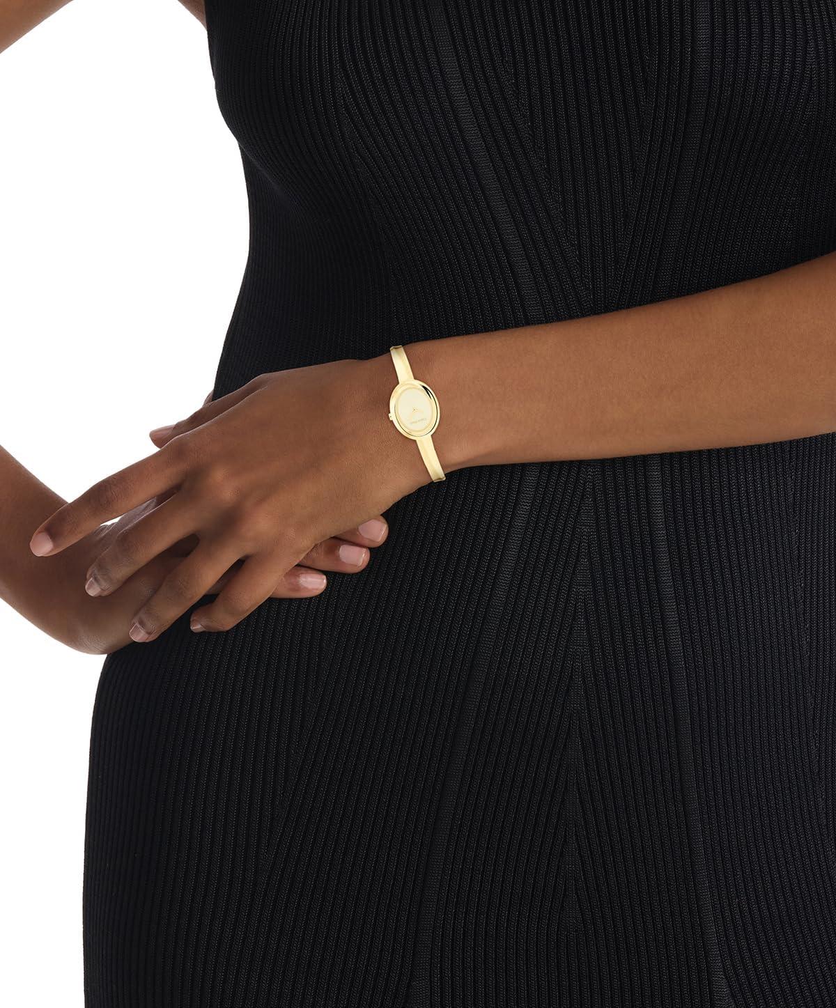 imageCalvin Klein Womens Twisted Bezel  24mm 2H Quartz Watch  Adjustable Stainless Steel Bangle  Water Resistance 30 Meters  Premium Fashion for All Occasions  Gift for HerGold Plated