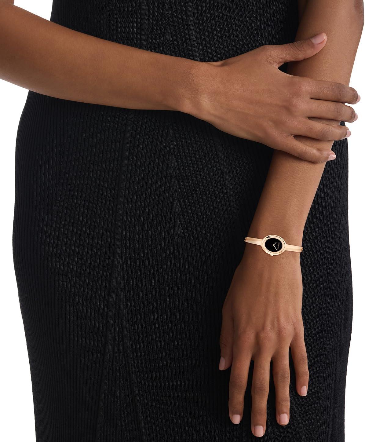 imageCalvin Klein Womens Twisted Bezel  24mm 2H Quartz Watch  Adjustable Stainless Steel Bangle  Water Resistance 30 Meters  Premium Fashion for All Occasions  Gift for HerCarnation Gold