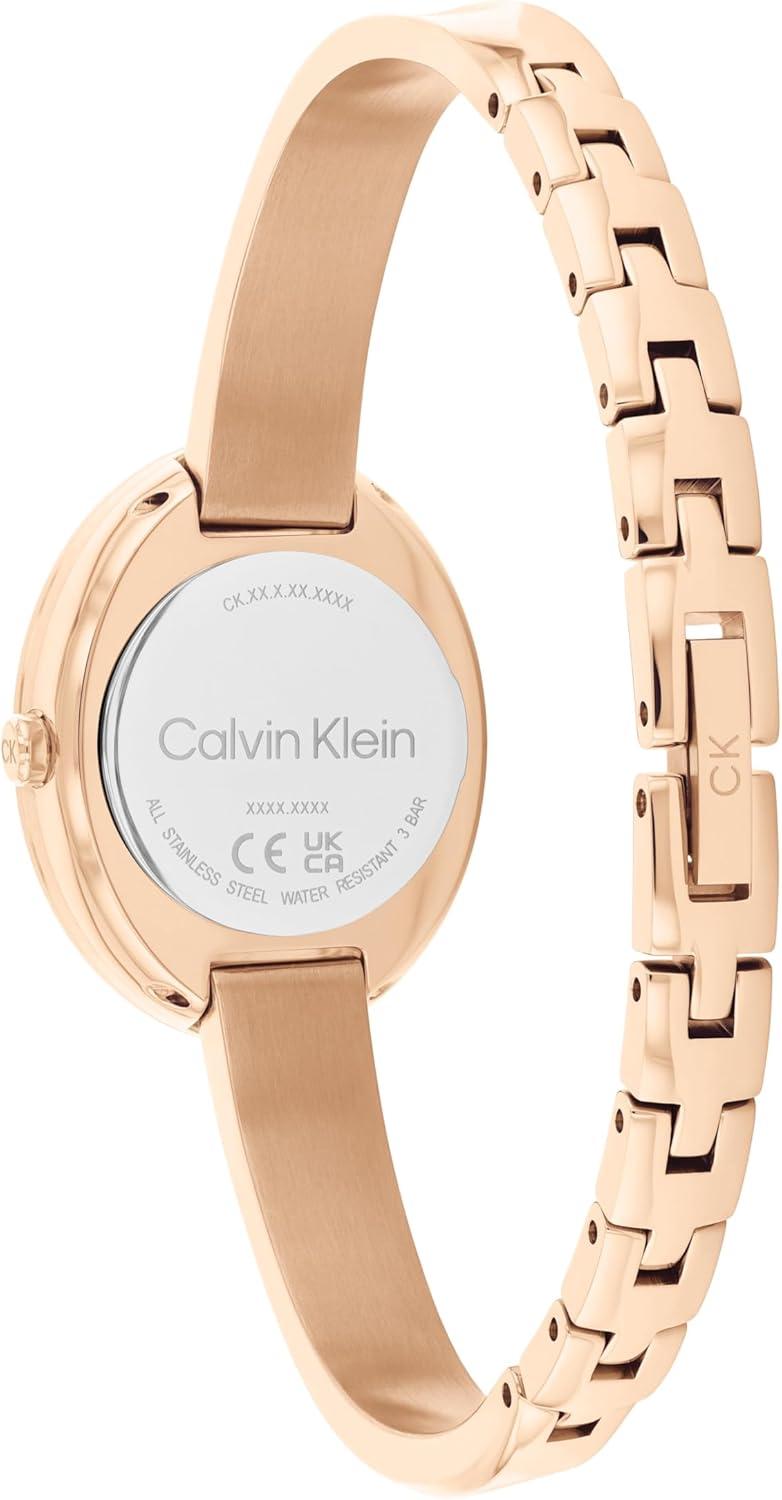 imageCalvin Klein Womens Twisted Bezel  24mm 2H Quartz Watch  Adjustable Stainless Steel Bangle  Water Resistance 30 Meters  Premium Fashion for All Occasions  Gift for HerCarnation Gold