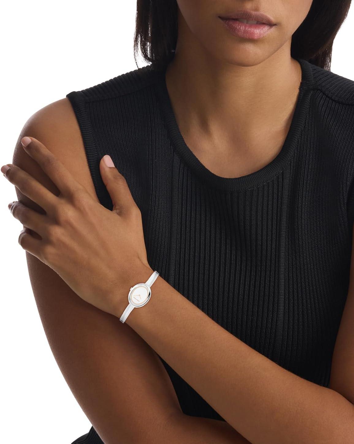 imageCalvin Klein Womens Twisted Bezel  24mm 2H Quartz Watch  Adjustable Stainless Steel Bangle  Water Resistance 30 Meters  Premium Fashion for All Occasions  Gift for HerSilver