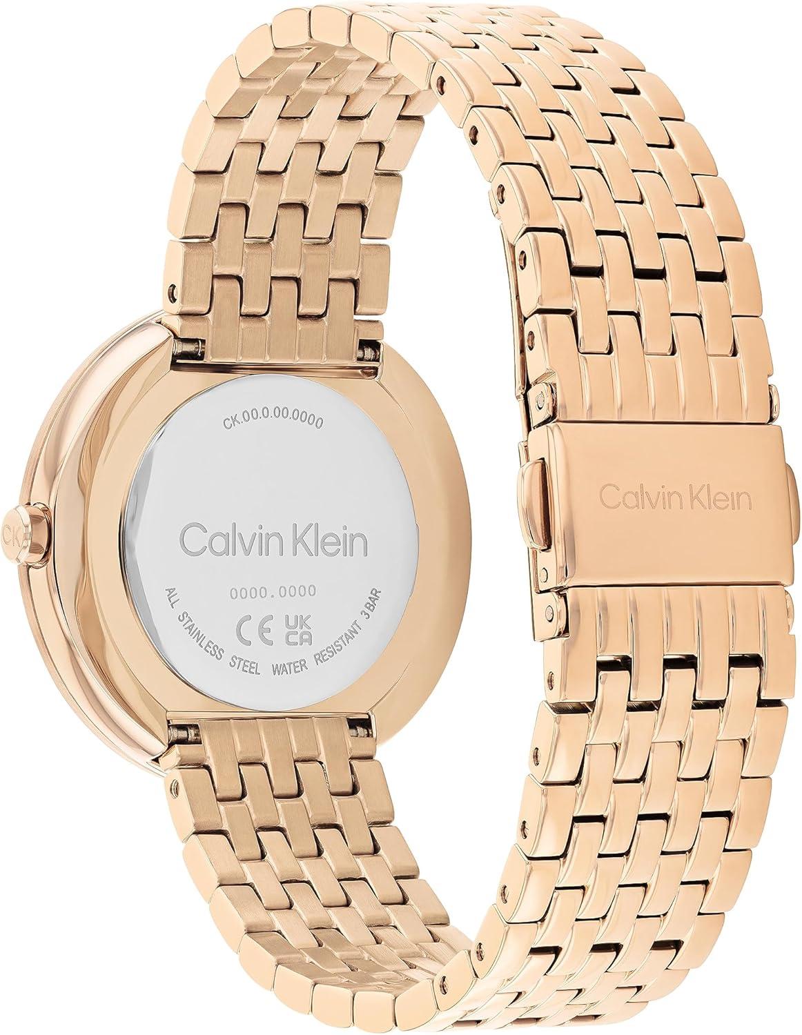 imageCalvin Klein Womens Twisted Bezel  34mm 2H Quartz Watch  Stainless Steel Bracelet  Water Resistance 30 Meters  Minimalistic Style  Premium Fashion  Gift for HerWhite Mother of PearlCarnation Gold