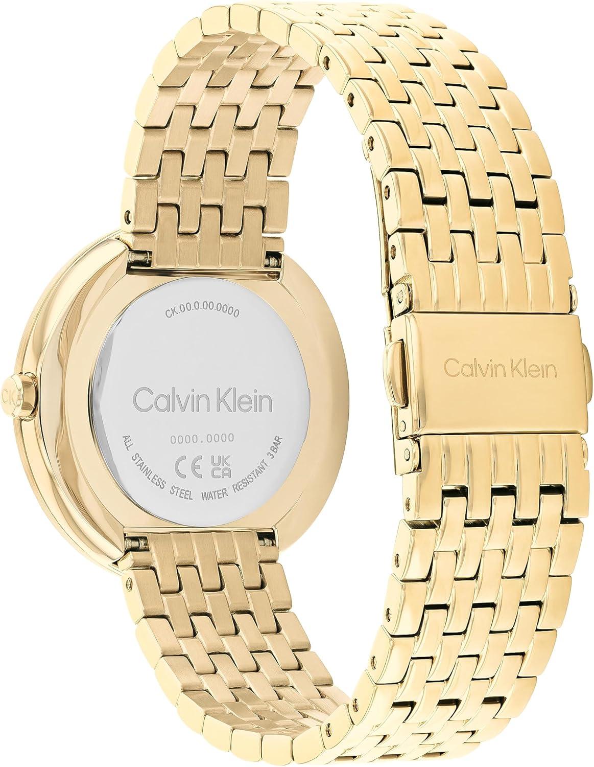 imageCalvin Klein Womens Twisted Bezel  34mm 2H Quartz Watch  Stainless Steel Bracelet  Water Resistance 30 Meters  Minimalistic Style  Premium Fashion  Gift for HerWhite Mother of PearlGold