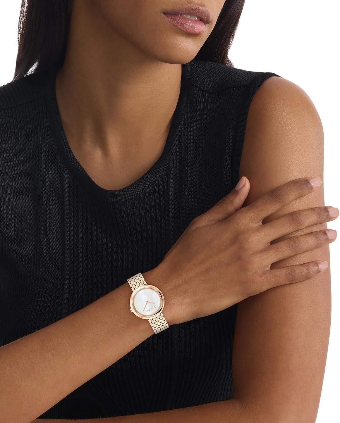 imageCalvin Klein Womens Twisted Bezel  34mm 2H Quartz Watch  Stainless Steel Bracelet  Water Resistance 30 Meters  Minimalistic Style  Premium Fashion  Gift for HerWhite Mother of PearlCarnation Gold