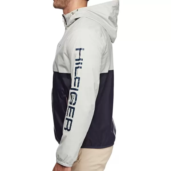 Tommy Hilfiger Mens Lightweight Active Water Resistant Hooded Rain JacketIceNavy Colorblock