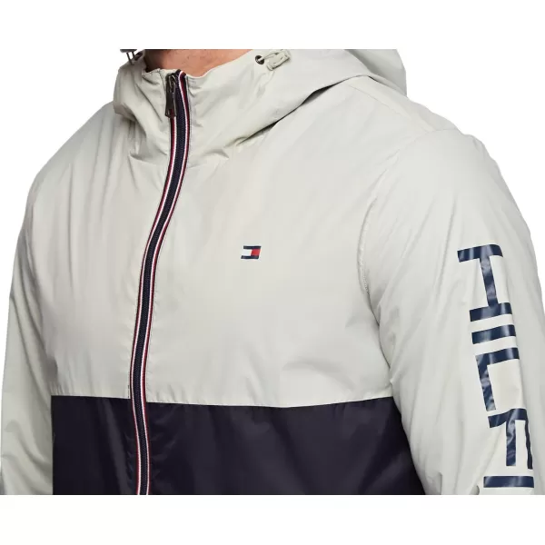 Tommy Hilfiger Mens Lightweight Active Water Resistant Hooded Rain JacketIceNavy Colorblock