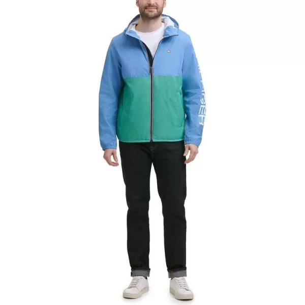 Tommy Hilfiger Mens Lightweight Active Water Resistant Hooded Rain JacketPastel BlueGreen Colorblock