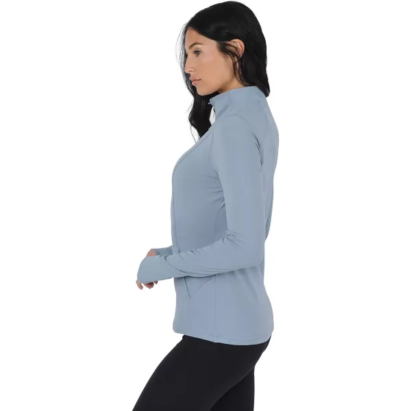 Yogalicious Nude Tech Half Zip Long Sleeve Jacket with Front PocketsTradewinds