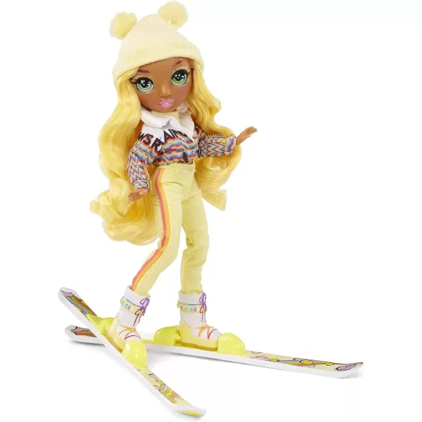 Rainbow High Winter Break Sunny Madison – Yellow Fashion Doll and Playset with 2 Designer Outfits, Pair of Skis &amp; Accessories