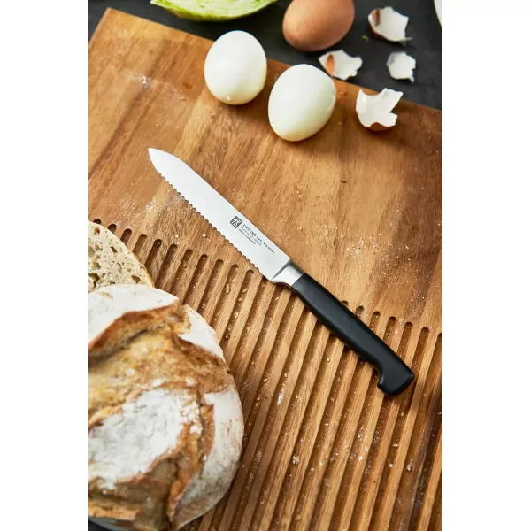 ZWILLING Four Star 5-inch Serrated Utility Knife, Black