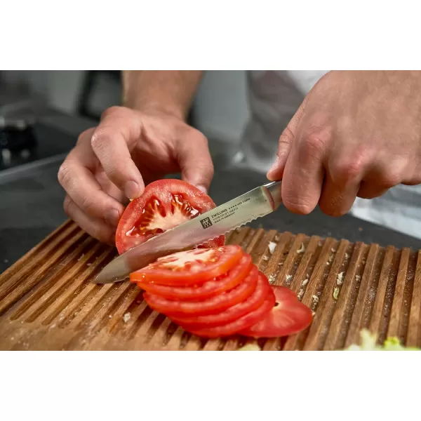 ZWILLING Four Star 5-inch Serrated Utility Knife, Black